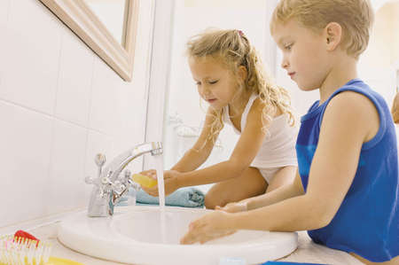 child wash hands
