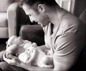 dad with newborn twins