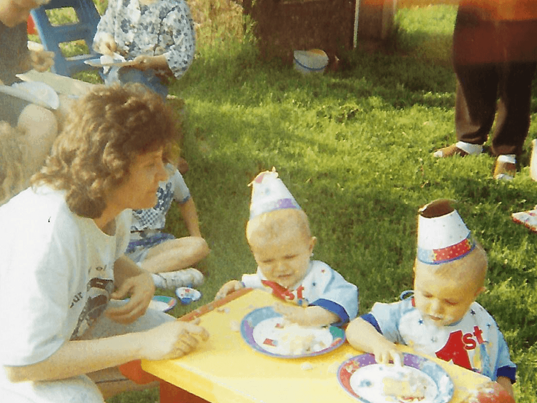 mom and twin babies at picnic table raise twins