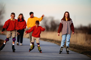 Kids Skating In Front of Parents