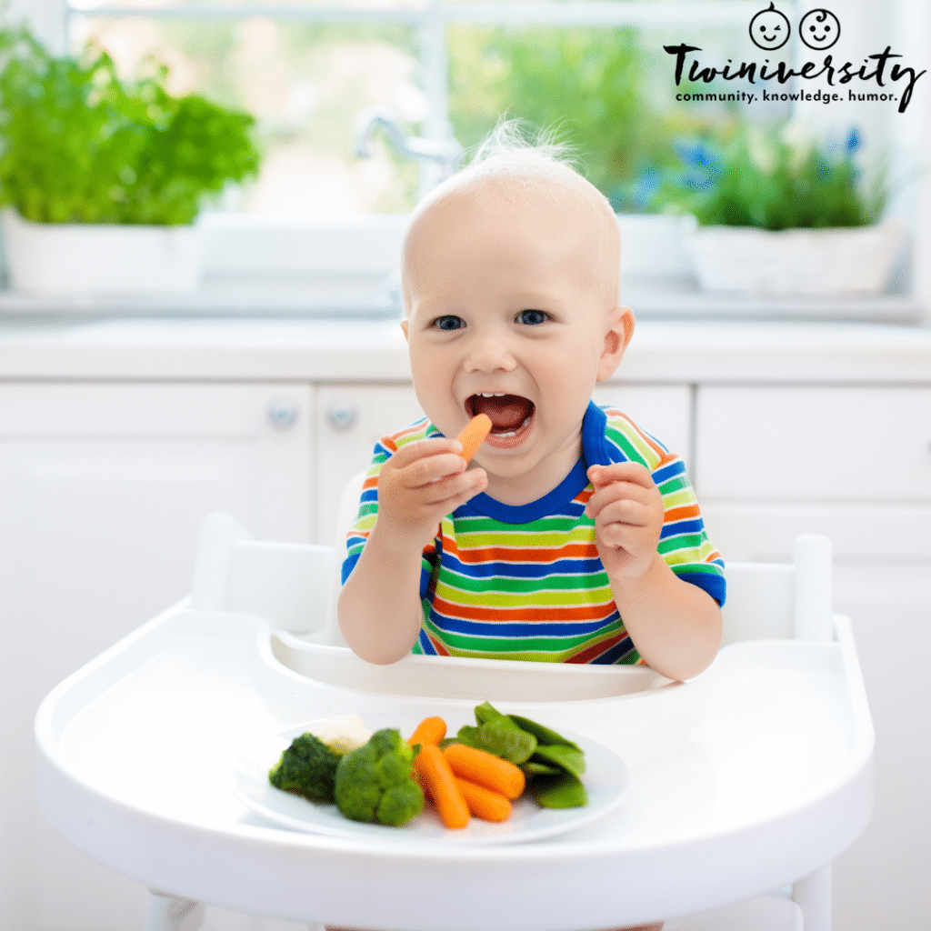 baby eating vegetables