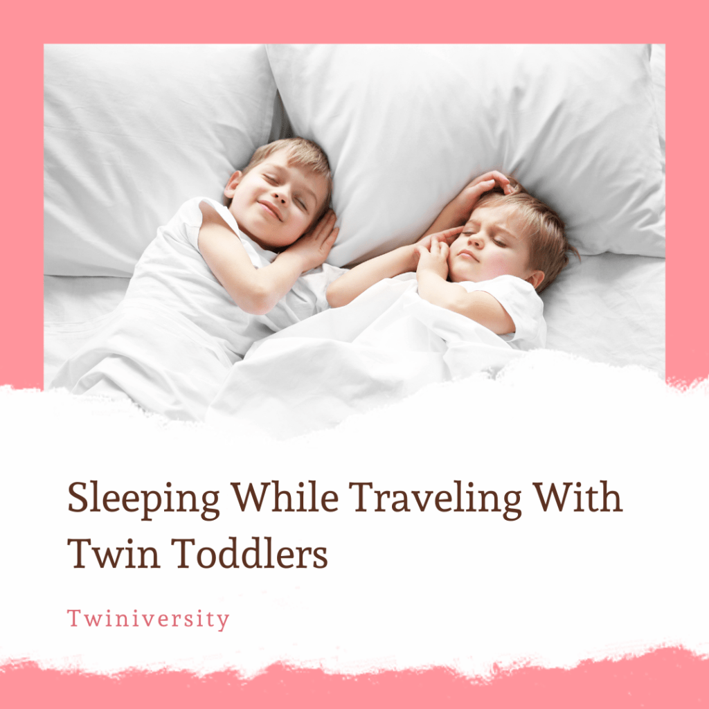 toddler twins sleeping on a bed