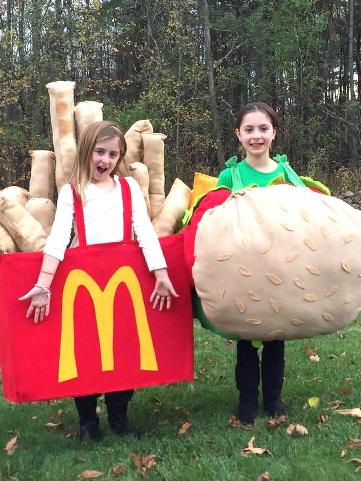 twin girls dressed up as mcdonald's fries and hamburger