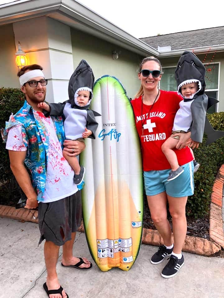 family dressed as a lifeguard beach bum and twin baby sharks