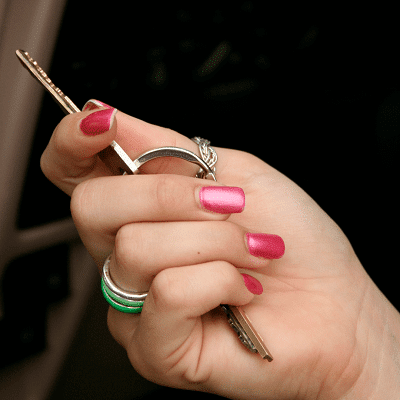 teen driver holding car keys