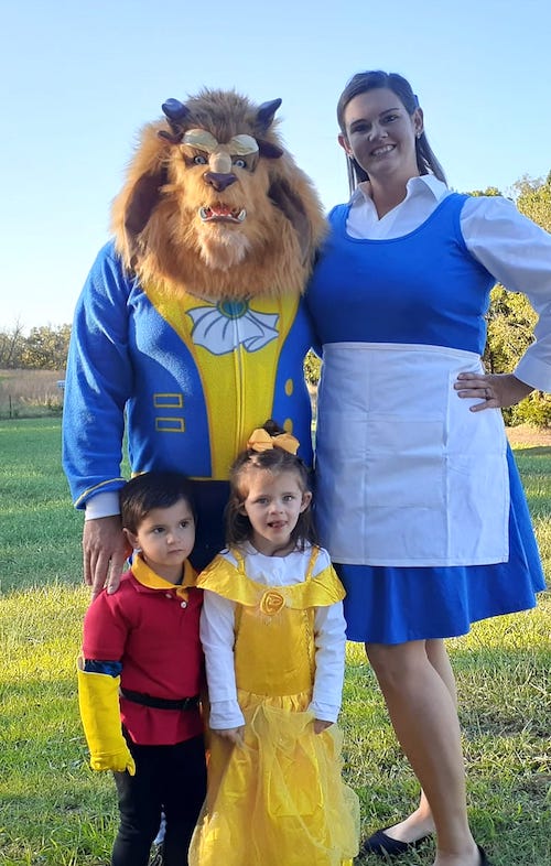 family dressed as Beauty and the Beast characters boy girl twin halloween costumes