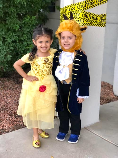 twins dressed as beauty and the beast boy girl twin halloween costumes