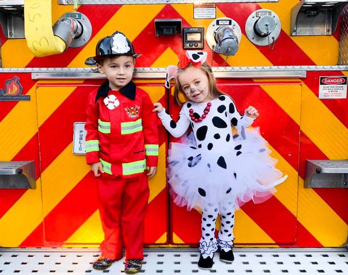 twins dressed as fireman and Dalmatian boy girl twin halloween costumes