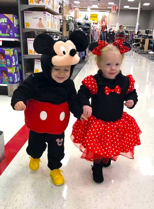 twin toddlers dressed as Mickey Mouse and Minnie Mouse boy girl twin halloween costumes