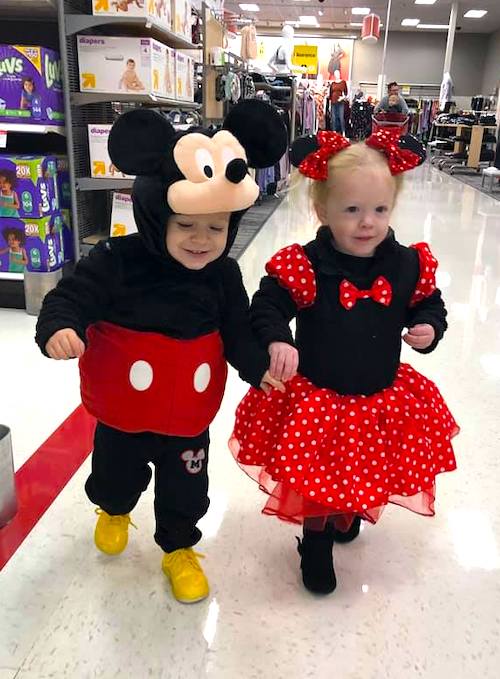 twin toddlers dressed as Mickey Mouse and Minnie Mouse boy girl twin halloween costumes 