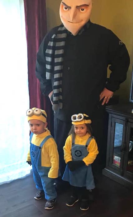 twin toddlers dressed as minions from despicable me boy girl twin halloween costumes