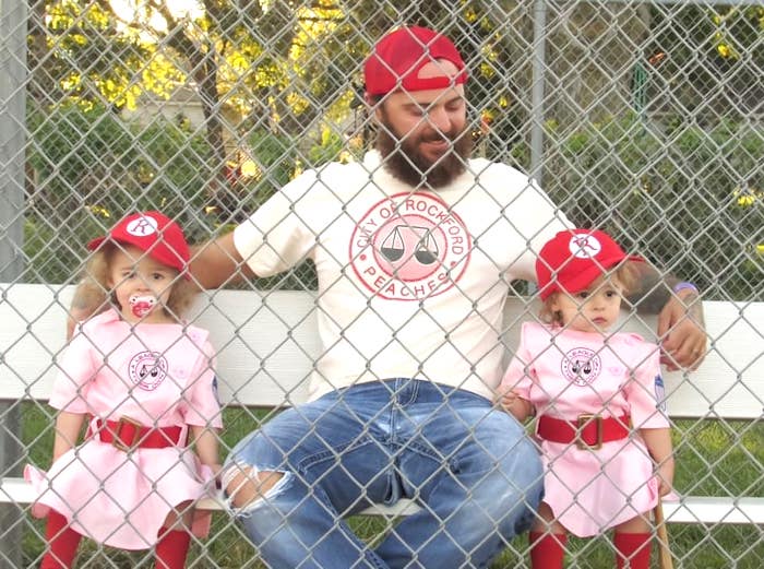 twin girls dressed as rockford peaches and their dad twin girls halloween costumes