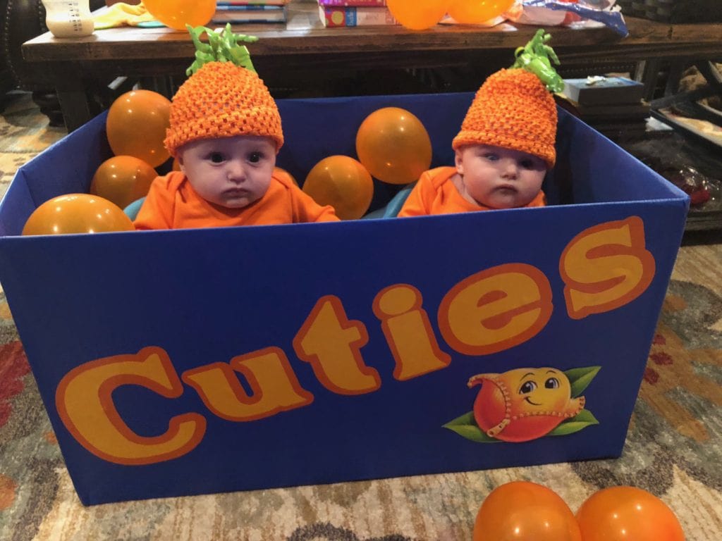 twin girls dressed as cuties oranges twin girls halloween costumes