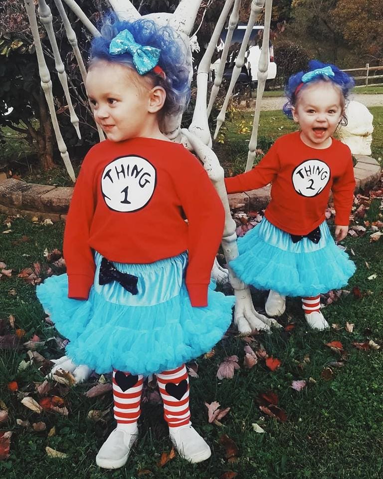 twin girls dressed as thing 1 and thing 2 twin girls halloween costumes