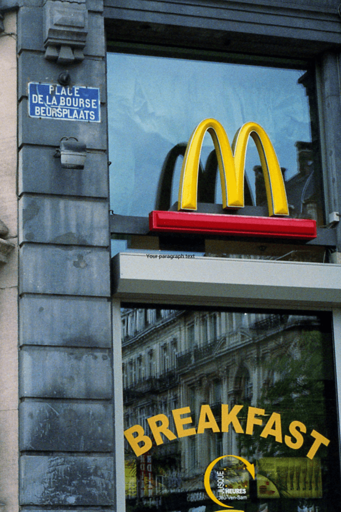 leftover Halloween candy outside of a McDonalds store, showing the large yellow M and the word breakfast on the window