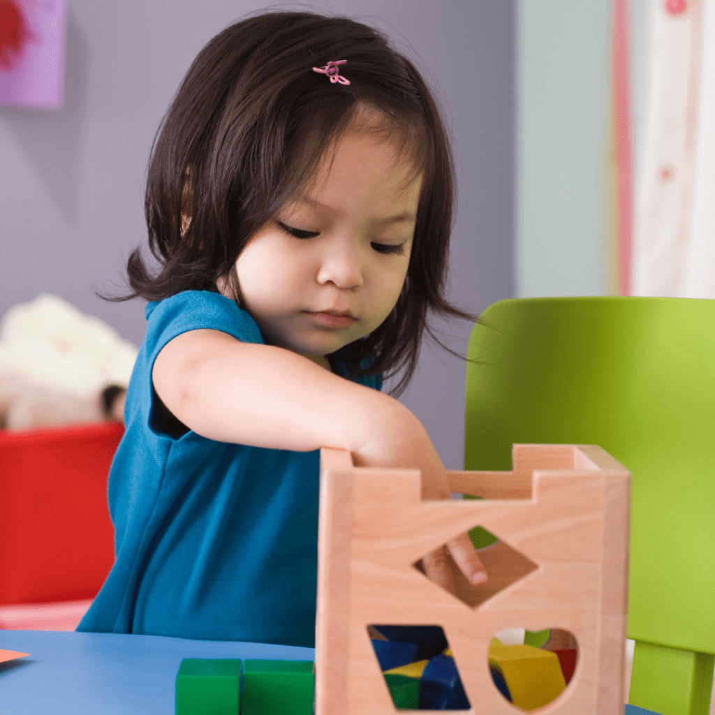 Play centers toddler with shape sorter