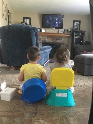 potty training regression boy/girl twins watching tv while sitting on potty seats