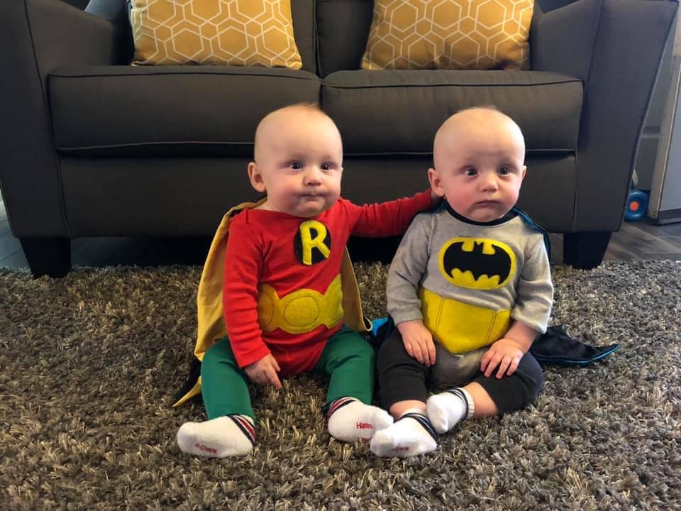 twin toddlers dressed as batman and robin twin boys halloween costumes