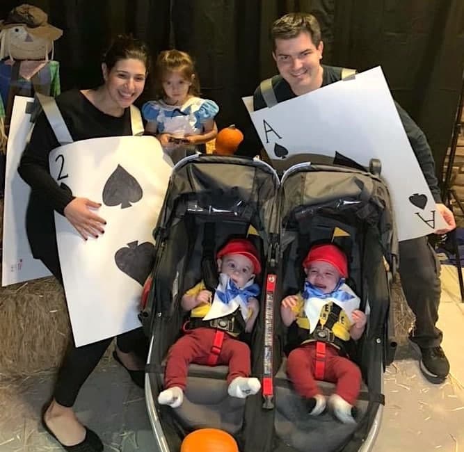 family dressed as alice in wonderland characters twin boys halloween costumes