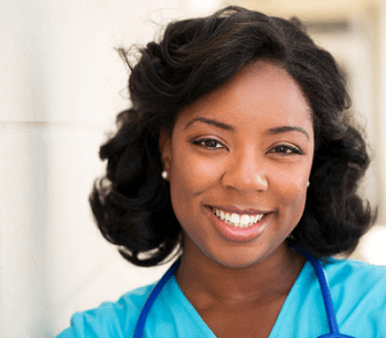 nicu nurse woman smiling wearing scrubs and a stethoscope around her neck