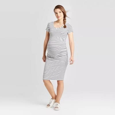 maternity baby shower dress pregnant woman in a black and white striped dress