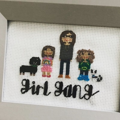 surviving divorce a cross-stitch sign with a woman, 2 girls, and 2 dogs