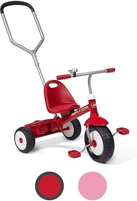 A red tricycle with a push handle on the back