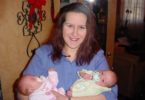 mom holding newborn twins
