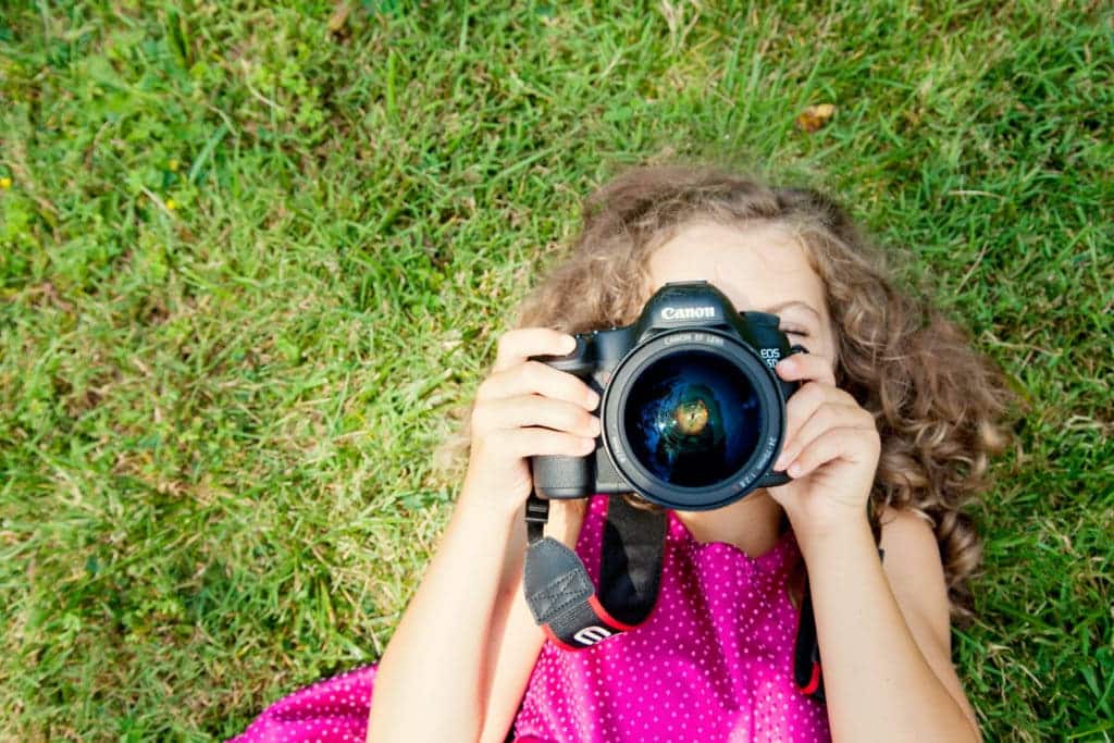 little girl with a camera