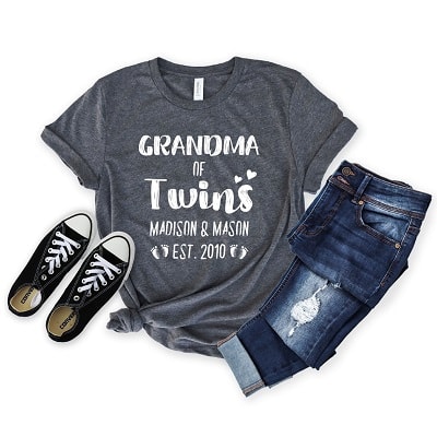 Grey grandma of twins shirt with black shoes and folded jeans