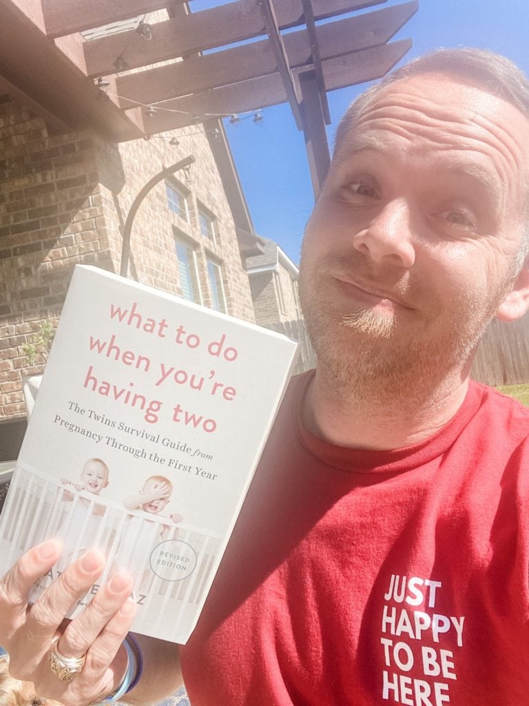 dad holding what to do when you're having two book