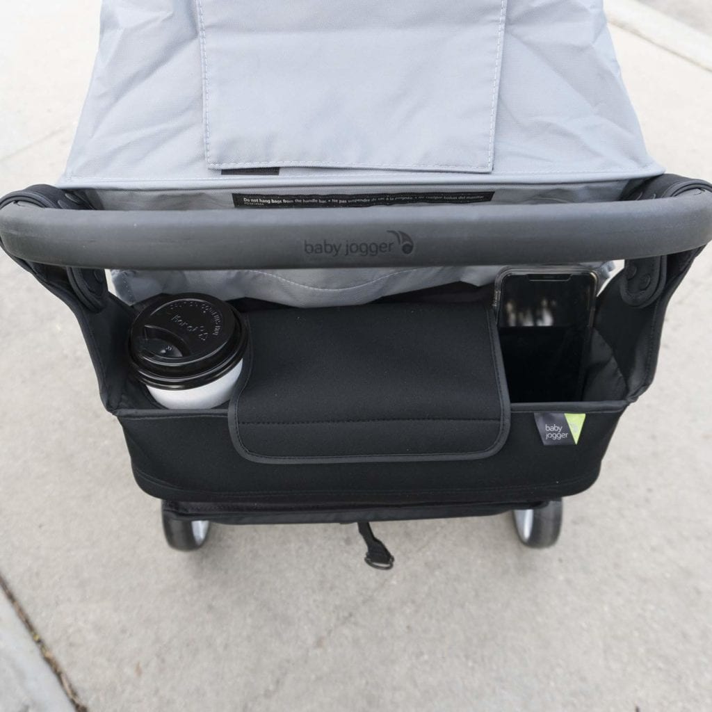 baby jogger parent console with cup and phone