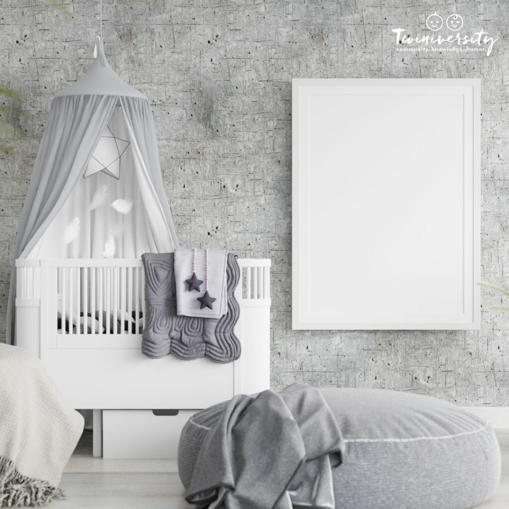 Go minimalistic for your twin boys' nursery with all white and monochrome