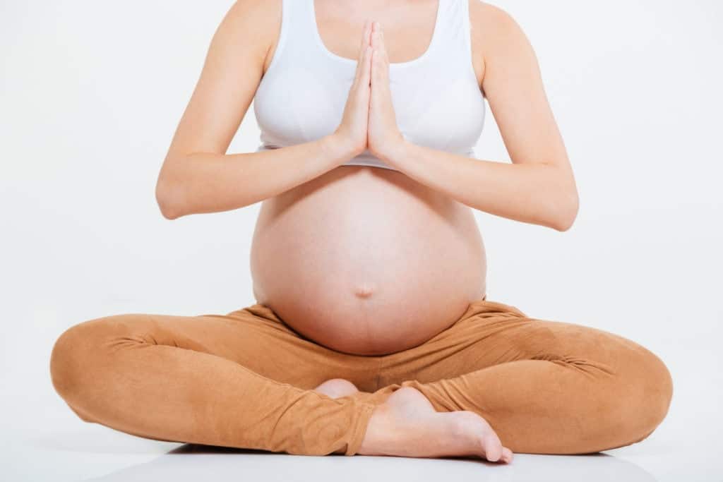 pregnant woman meditating