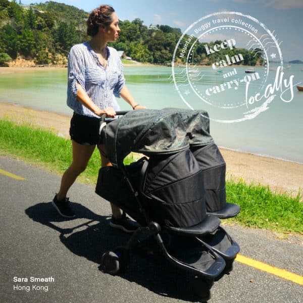 woman pushing twins in a mountain buggy nano duo