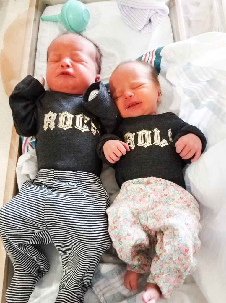 newborn boy girl twins wearing shirts that say ROCK and ROLL