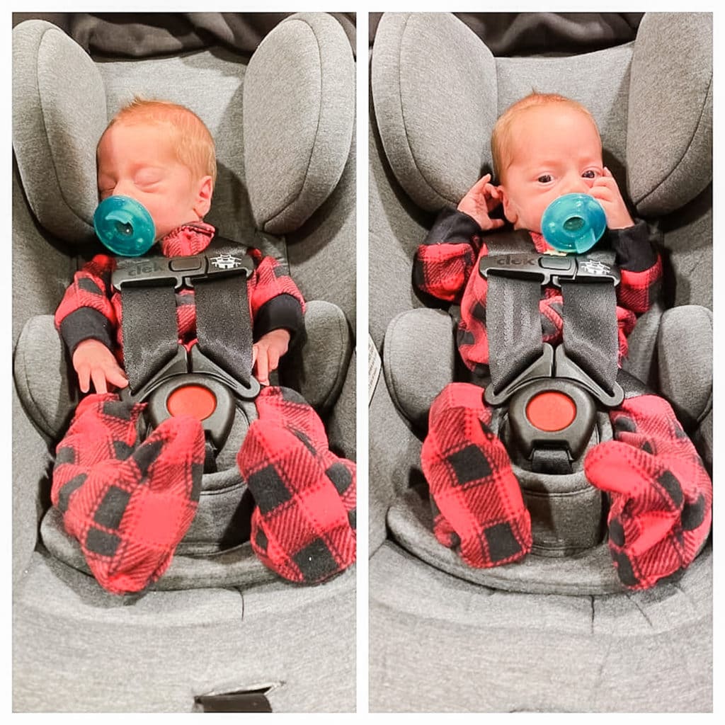twin boys in identical red and black jammies in their car seats