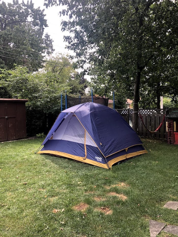 tent set up in a backyard