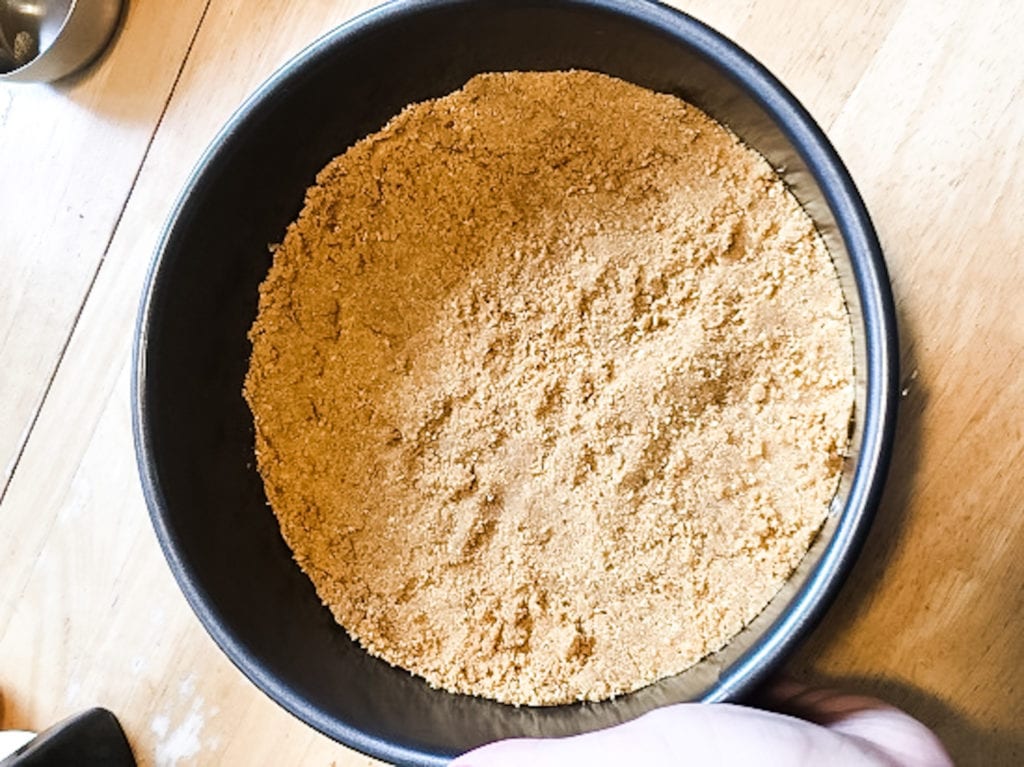 graham cracker crust in a pie pan