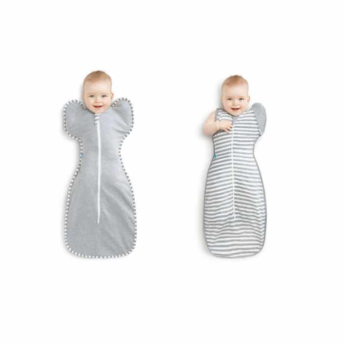 two infants in grey sleep sacks. one with an arm out and the other with both arms in. One sack is solid grey and the other is grey and white striped. twin baby shower gift ideas boy and girl
