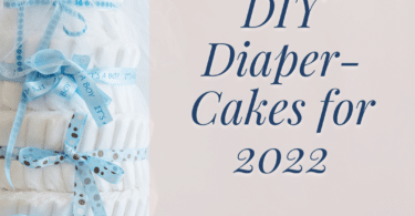 a white diaper cake with blue ribbon and lettering reading DIY diaper cakes for 2022 and the word Twiniversity
