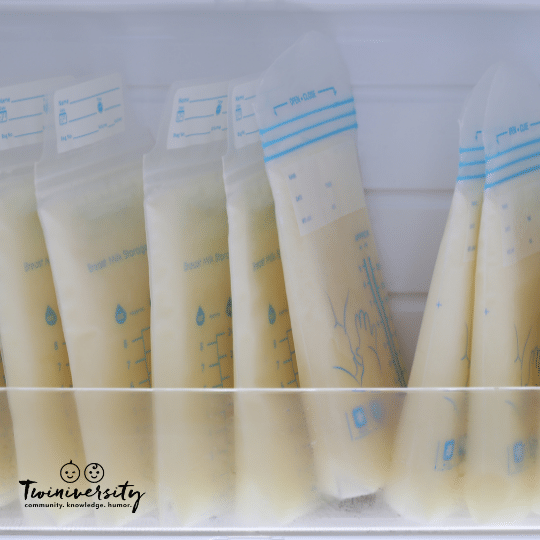 breast milk storage bags filled with breast milk and stored in containter