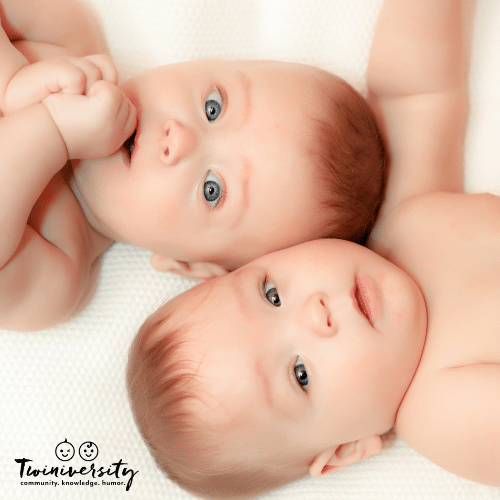 image of twin babies laying side by side prenatal genetic testing
