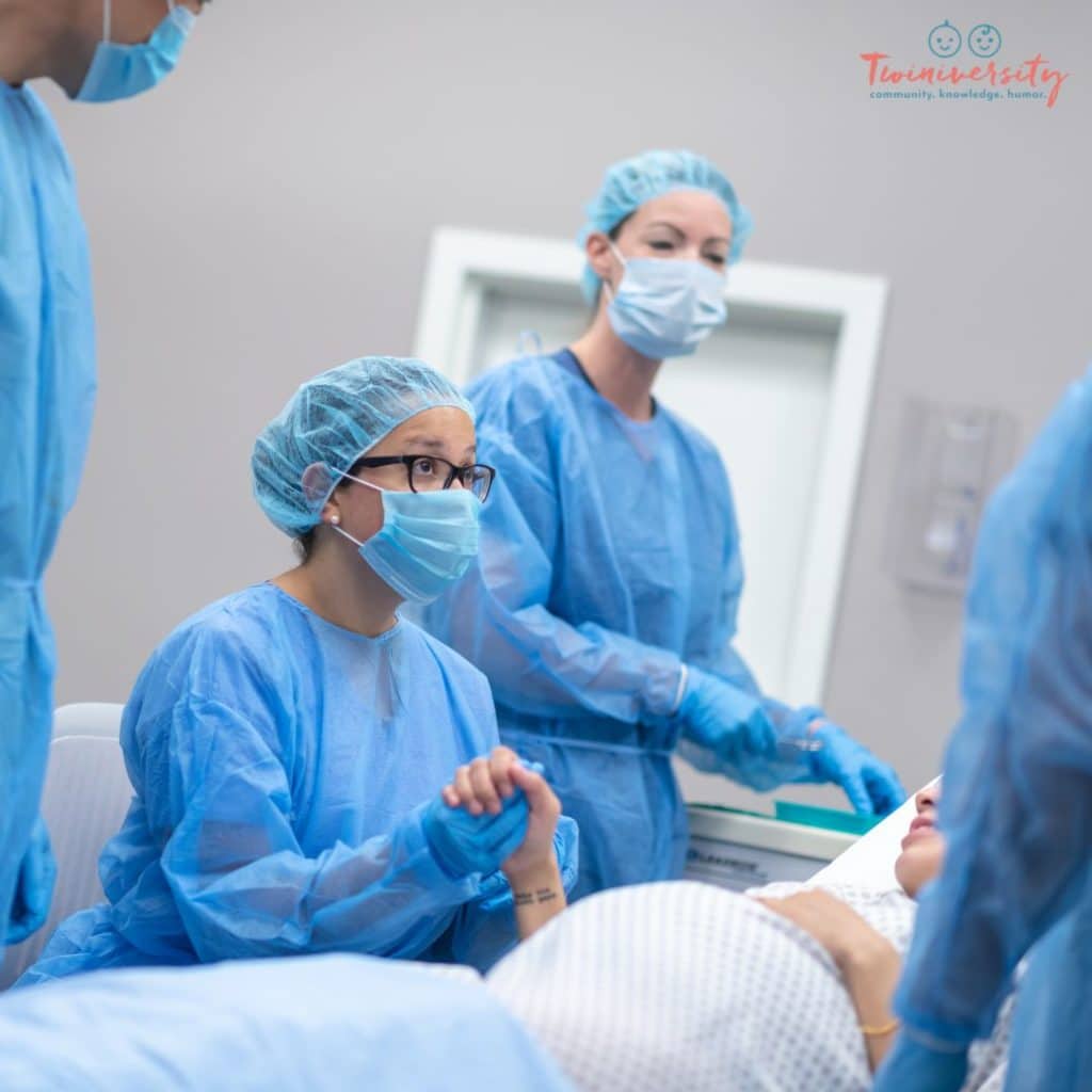 A pregnant woman in the operating room preparing for her C-section