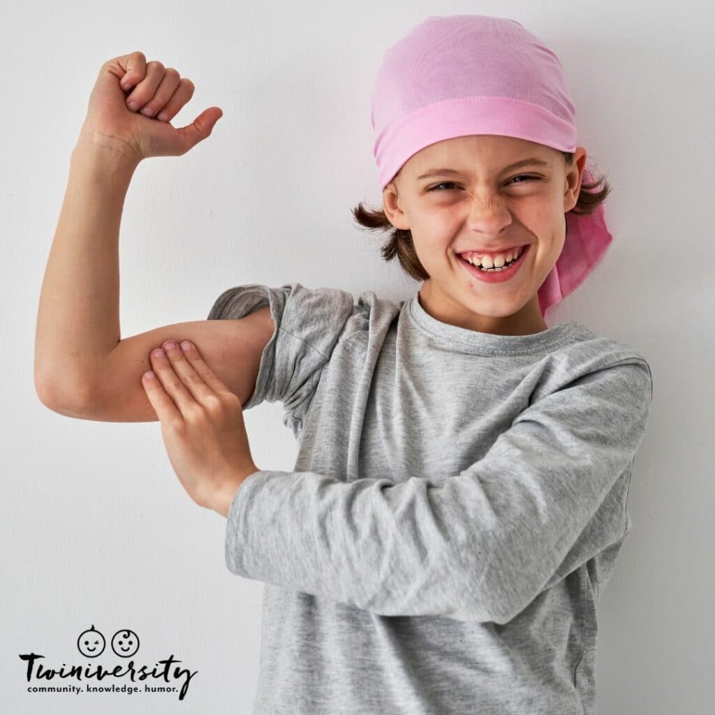 Young man showing off his self-confidence by flexing his muscles
