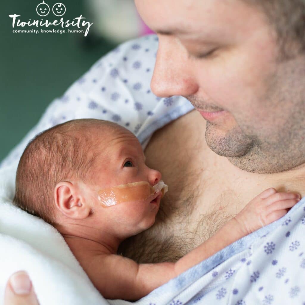 A father and newborn premie baby having some skin-to-skin time. 