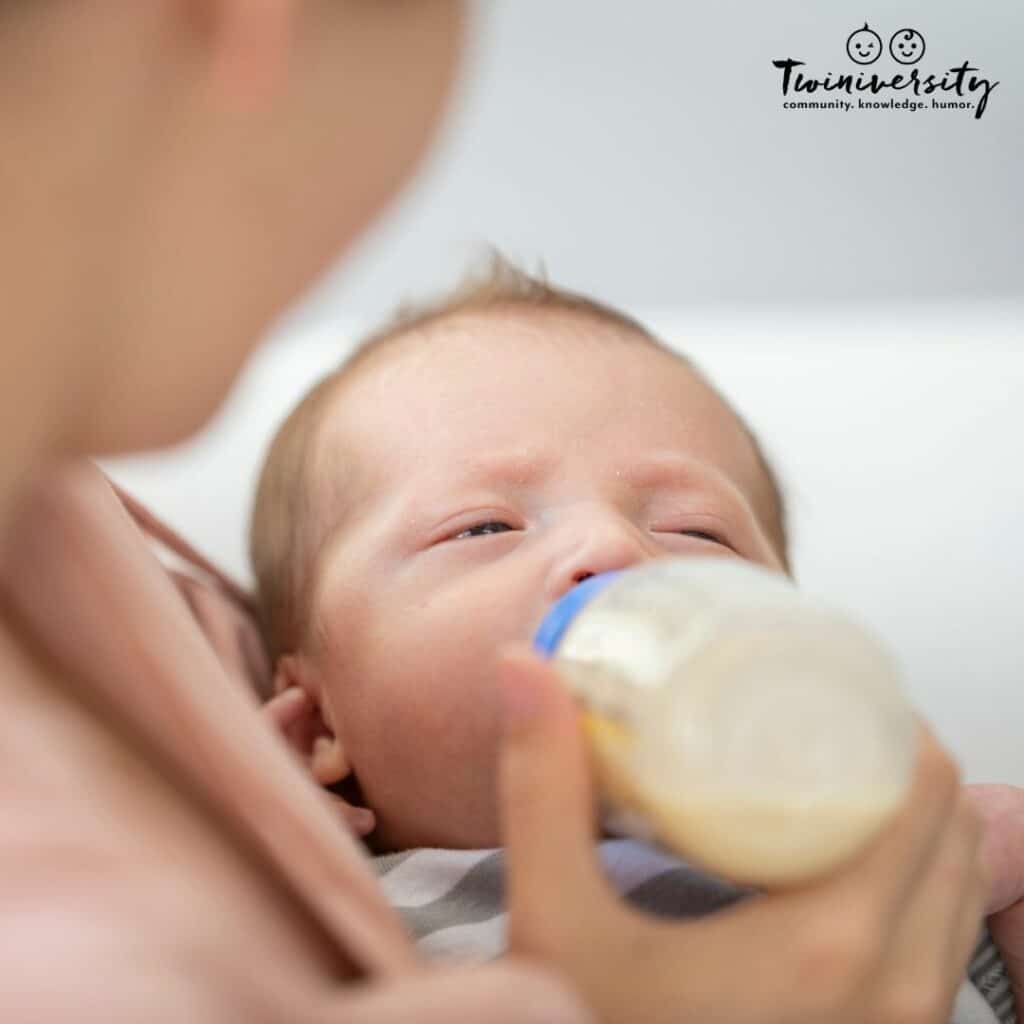 Mom and baby practicing paced bottle feeding