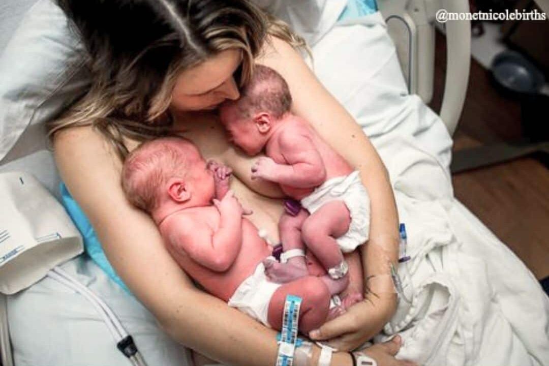 New mom of twins getting some skin-to-skin time after birth.