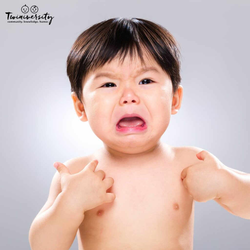 Little boy crying because he fears bathtime