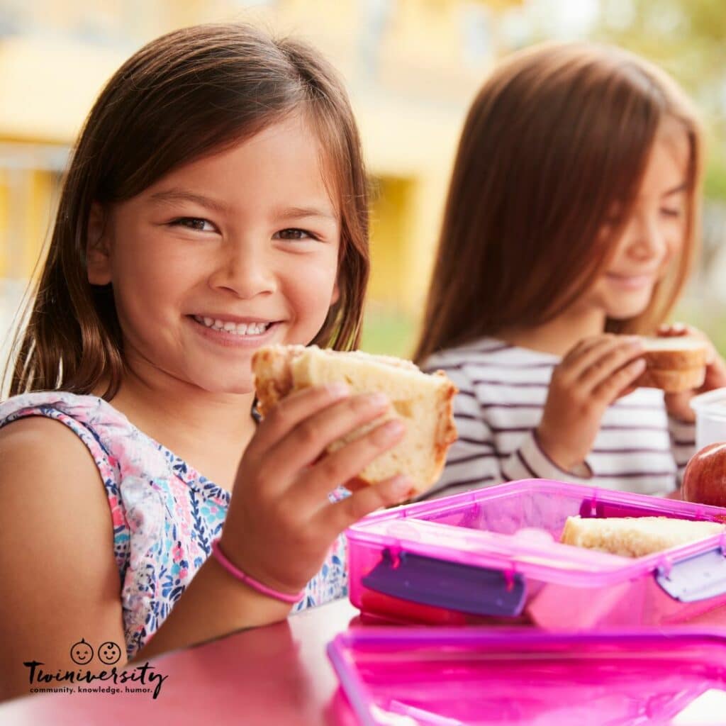 Kindergarten with twins mean choosing to send them with home lunch or let them eat school lunch.